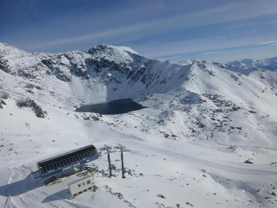 Aerial view of the Curvey Basin top terminal at The Remarkables looking across to Lake Alta