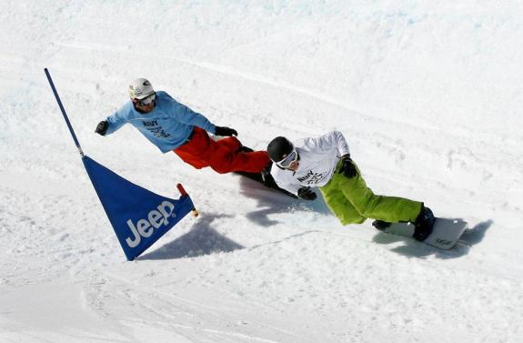 Kevin Hill leads while Nick Baumgartner follows in the Mens boardercross finals at X-Games 15