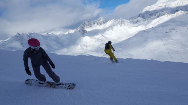 Snowboarder and Skier Tignes