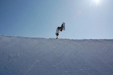 Local rider rocking the hand plant in Nozawa's pipe