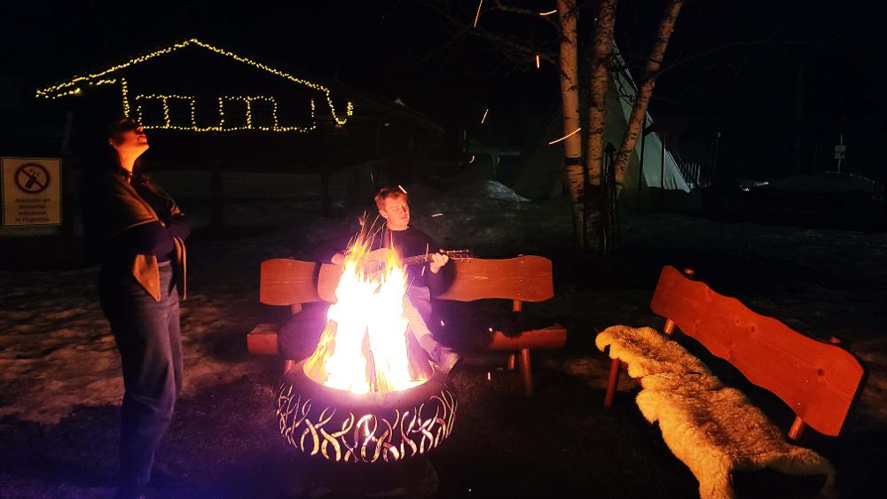 Fireside guitar playing in Lenk/Adelboden